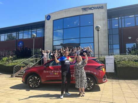 ABP Southampton Marathon Trethowans Rees Leisure with car and staff outside Trethowans Southampton office.