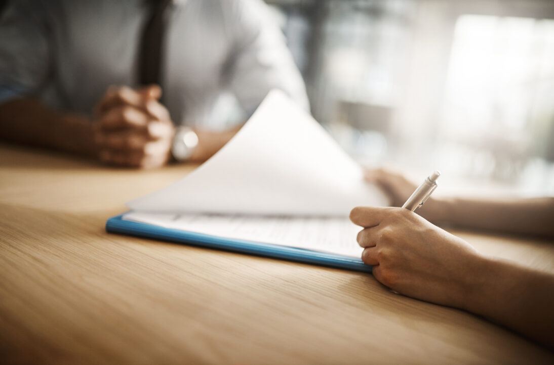 Business, hands and people with signature in office for insurance or life policy agreement. Deal, document and paperwork or contract for legal approval with terms and conditions and application.