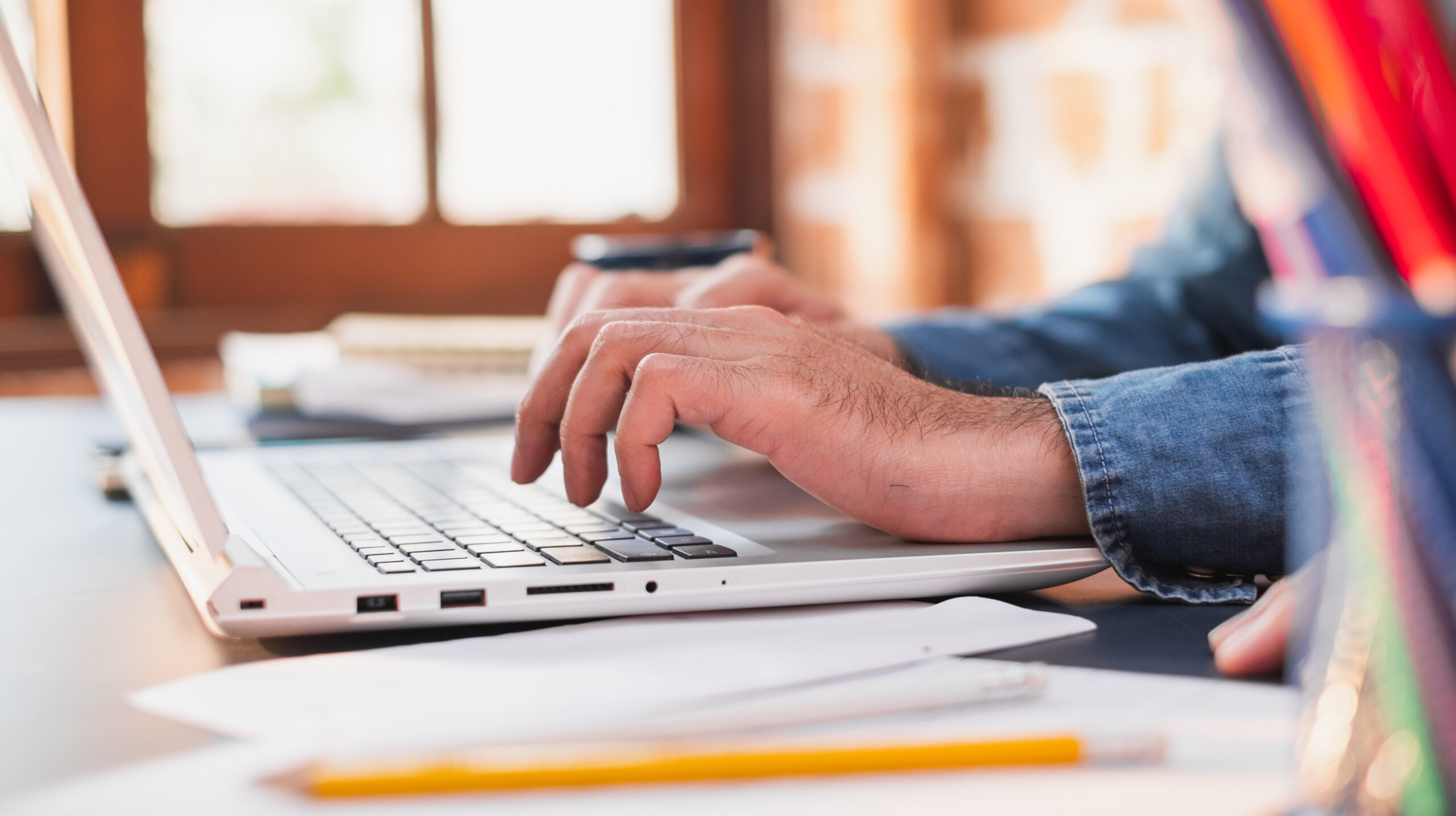 usiness people working on laptop at home, quarantine from coronavirus covid-19, work from home or work at home and social distancing concept