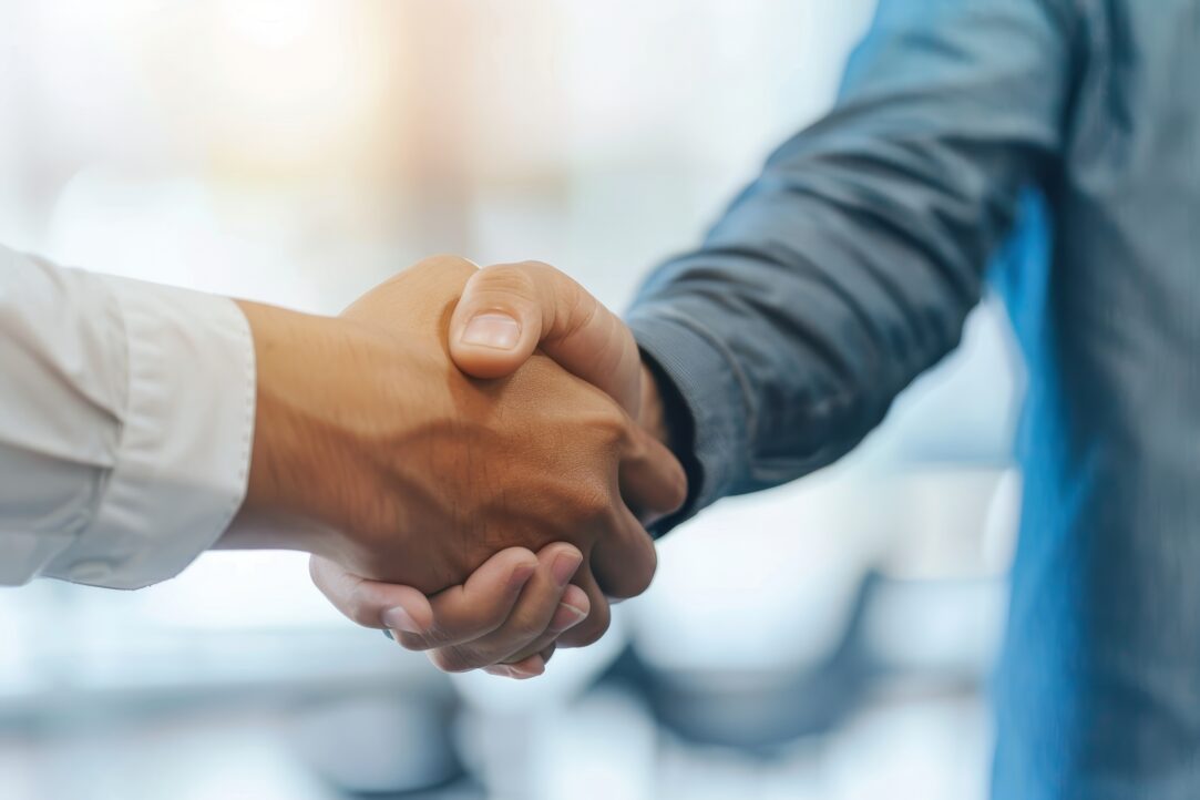 Businessmen handshake in photography shot business meeting and partnership concept with copy space