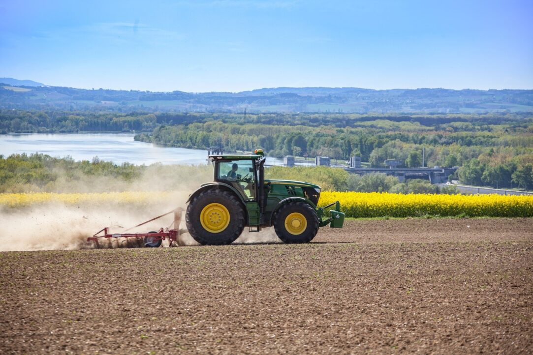 Tractor farming on a field